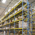 warehouse rack with pallet beam stops