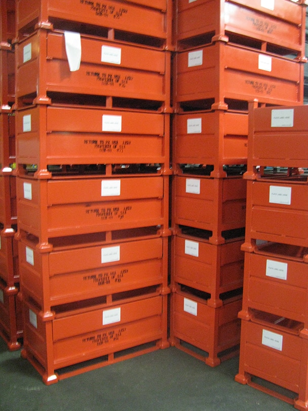 stacked steel containers with floor runners